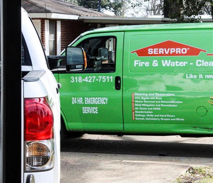 SERVPRO Van parked outside a client's house